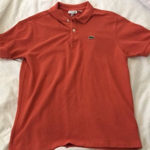 boy’s orange lacoste polo